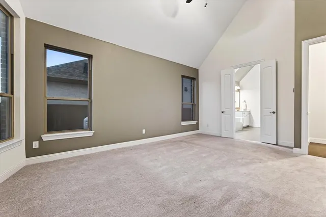 a bathroom with a bathtub sink and mirror