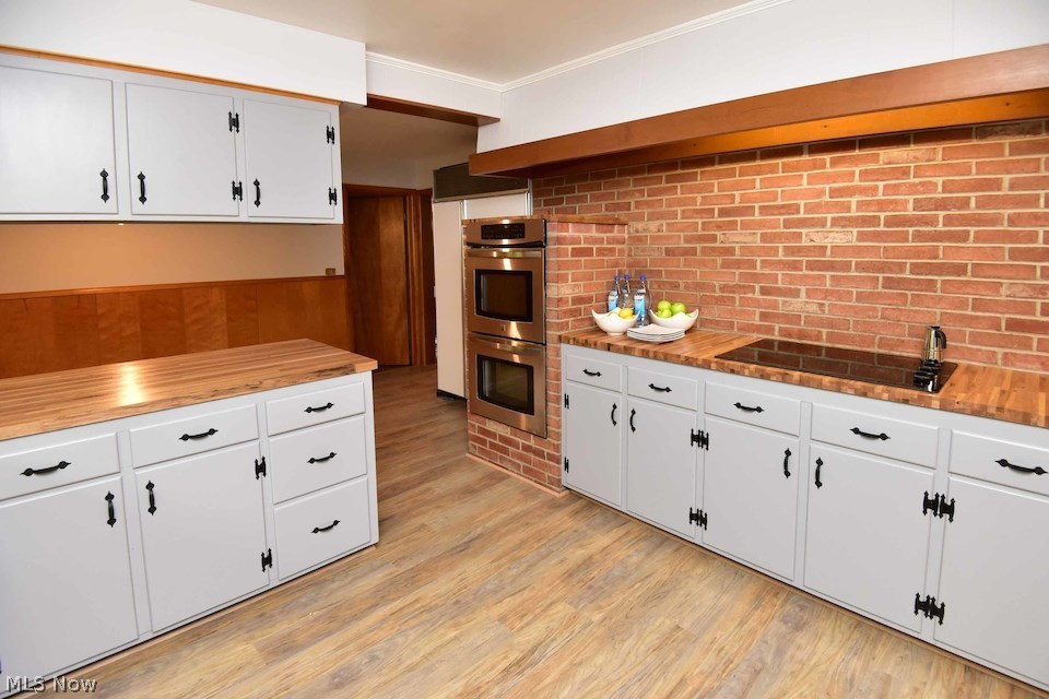 295 River Road Hinckley, OH 44233 - Photo 12 of 25 An indulgent oven arrangement and cooking space with genuine brick finishes.
