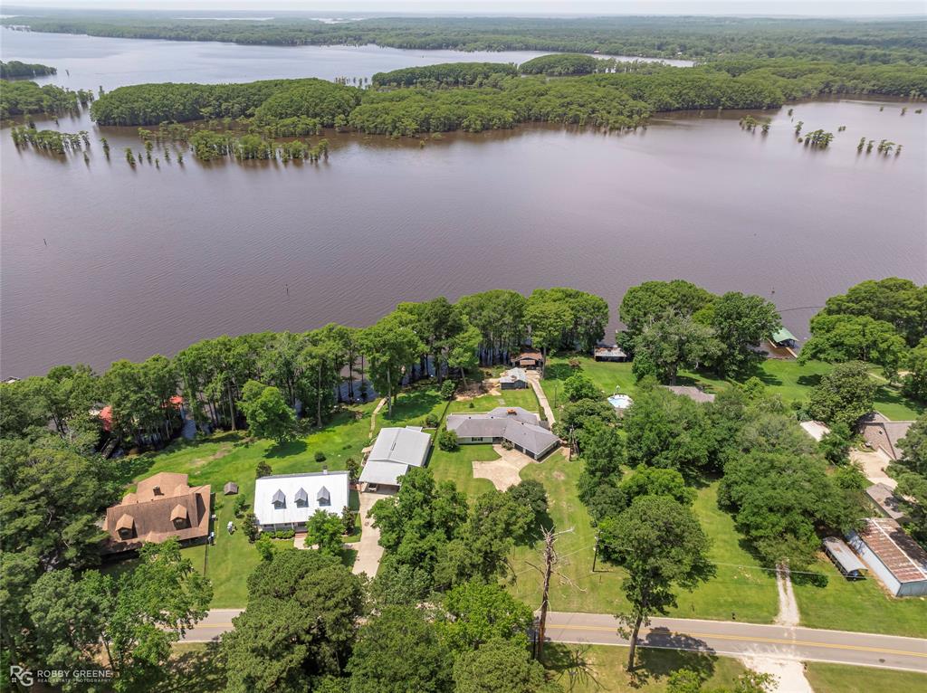 10865 Ferry Lake Road Oil City, LA 71061 - Photo 33 of 36 Drone / aerial view of a nearby body of water
