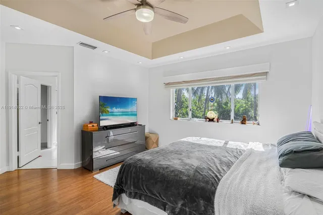 a bathroom with a granite countertop sink mirror and double
