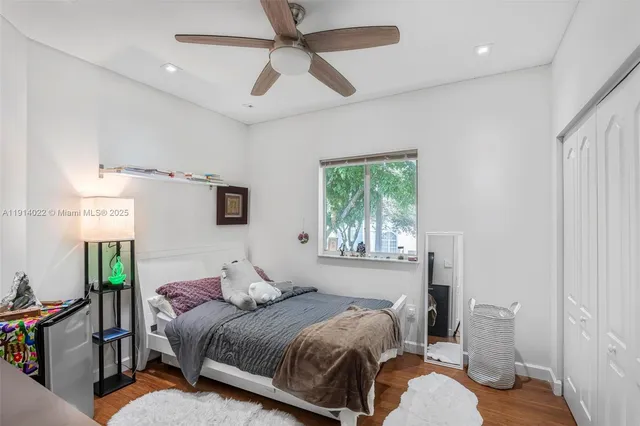 a bathroom with a sink toilet and mirror