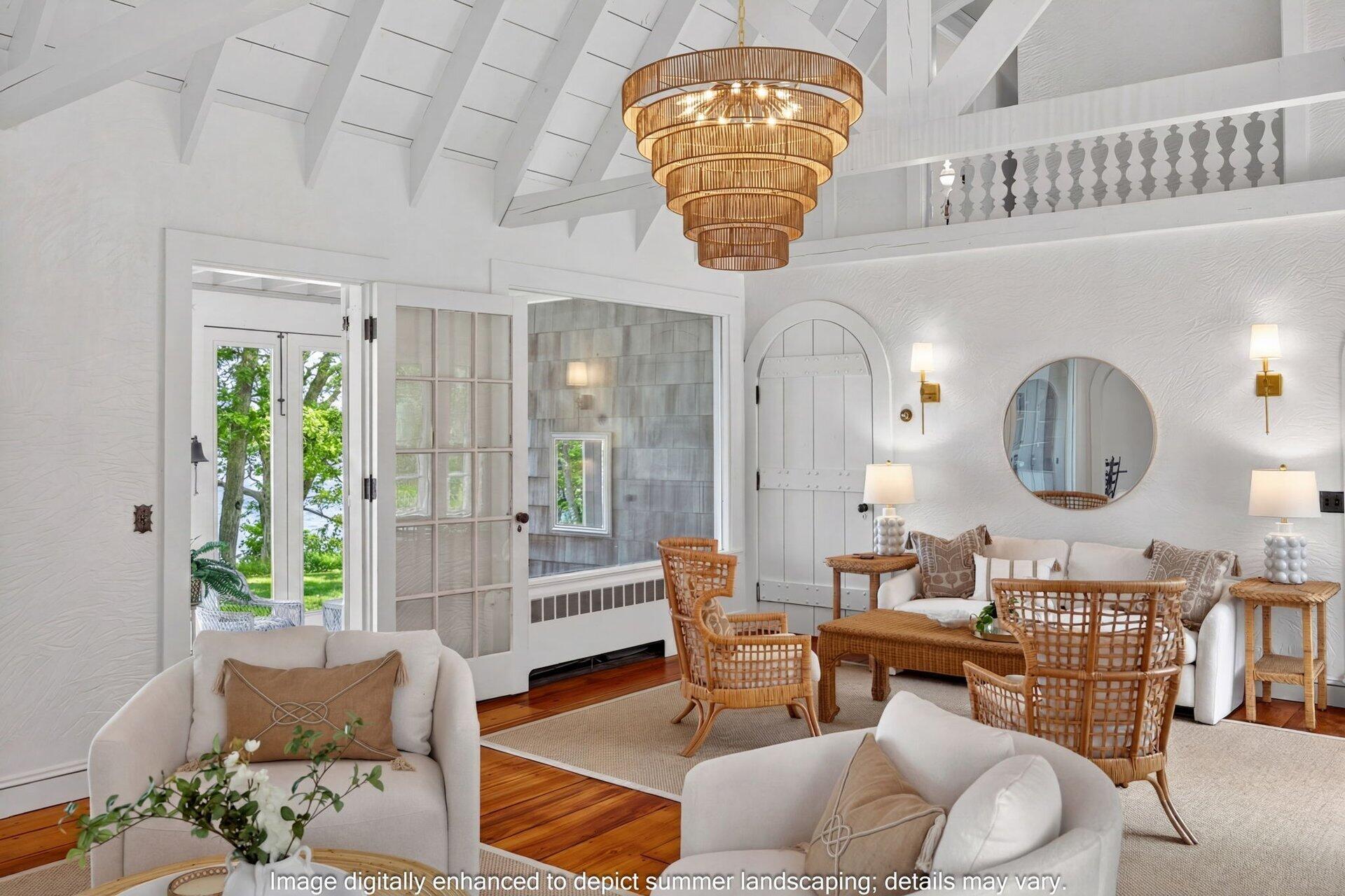2079 Head Of The Bay Road Harwich, MA 02645 - Photo 11 of 43 a living room with furniture a chandelier and a large window
