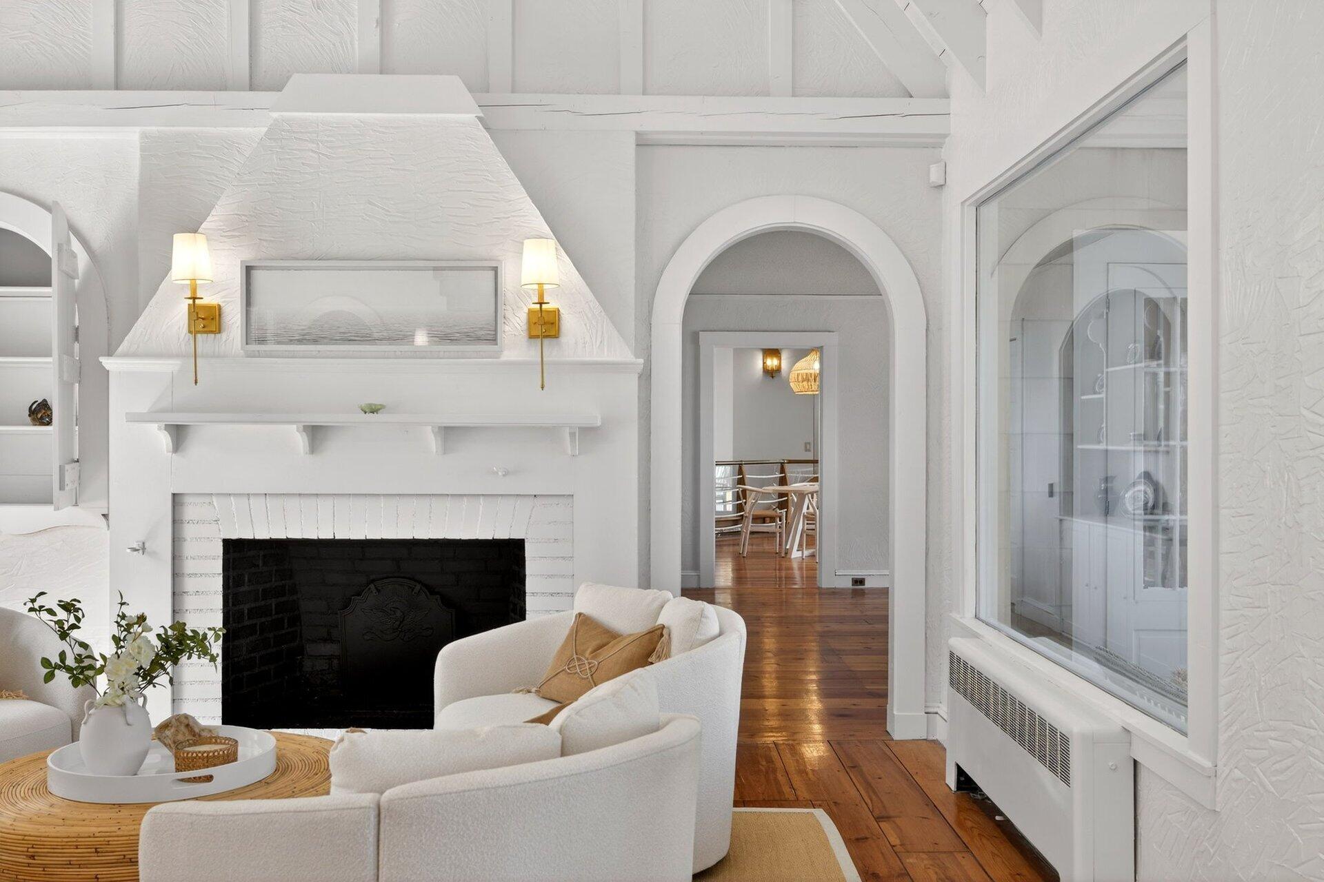 2079 Head Of The Bay Road Harwich, MA 02645 - Photo 12 of 43 a living room with furniture and a fireplace