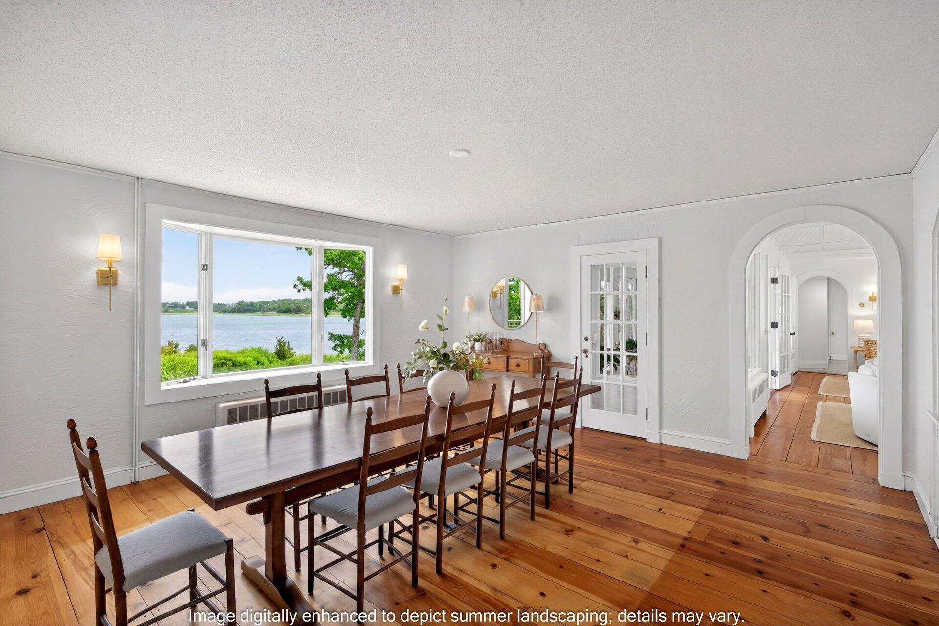 2079 Head Of The Bay Road Harwich, MA 02645 - Photo 13 of 43 a dining room with furniture a rug and wooden floor