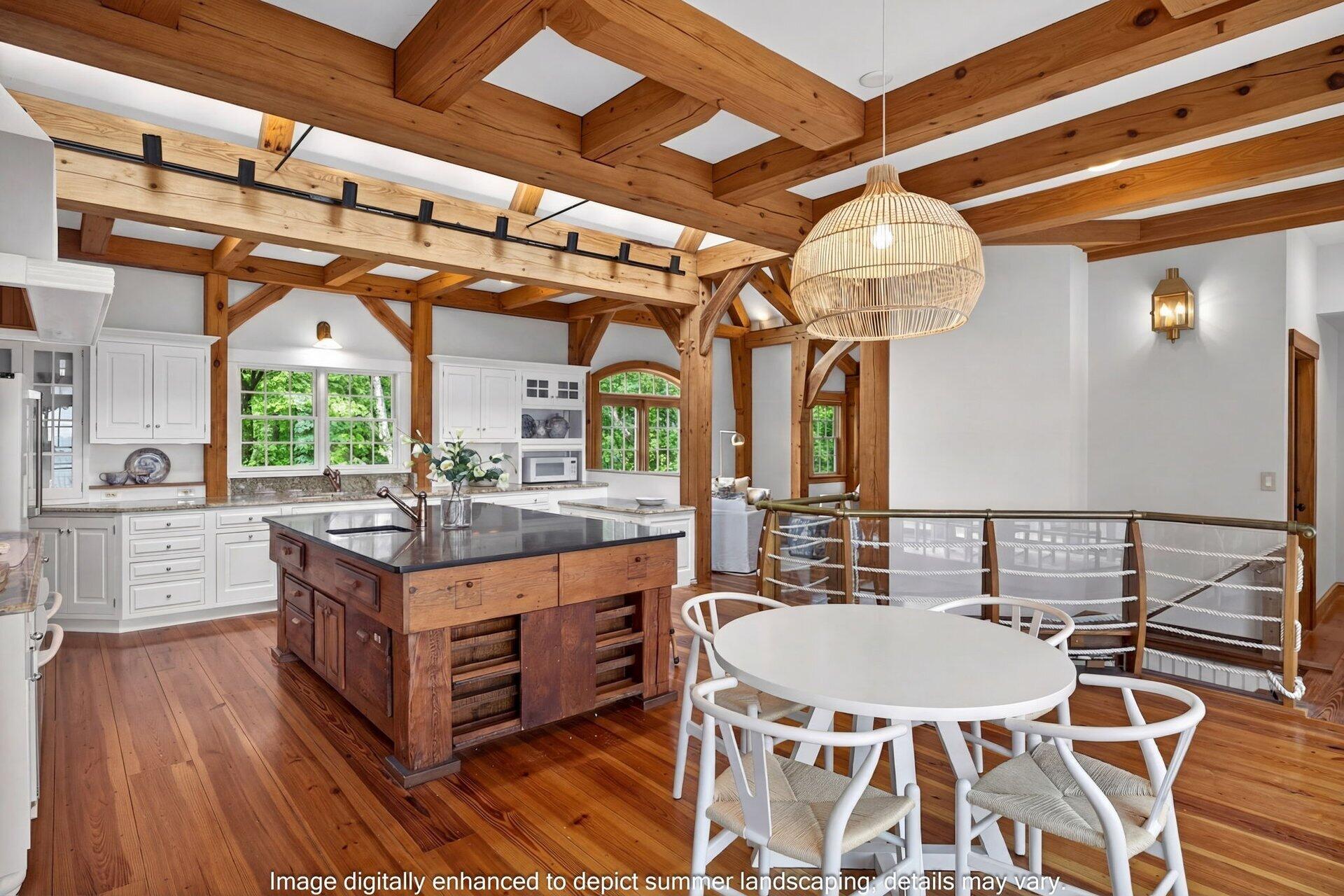 2079 Head Of The Bay Road Harwich, MA 02645 - Photo 17 of 43 a kitchen with stainless steel appliances granite countertop a white cabinets and wooden floor