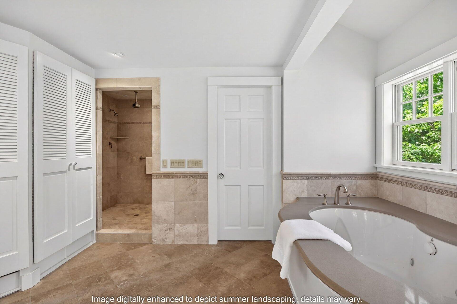 2079 Head Of The Bay Road Harwich, MA 02645 - Photo 27 of 43 a spacious bathroom with a tub shower and sink