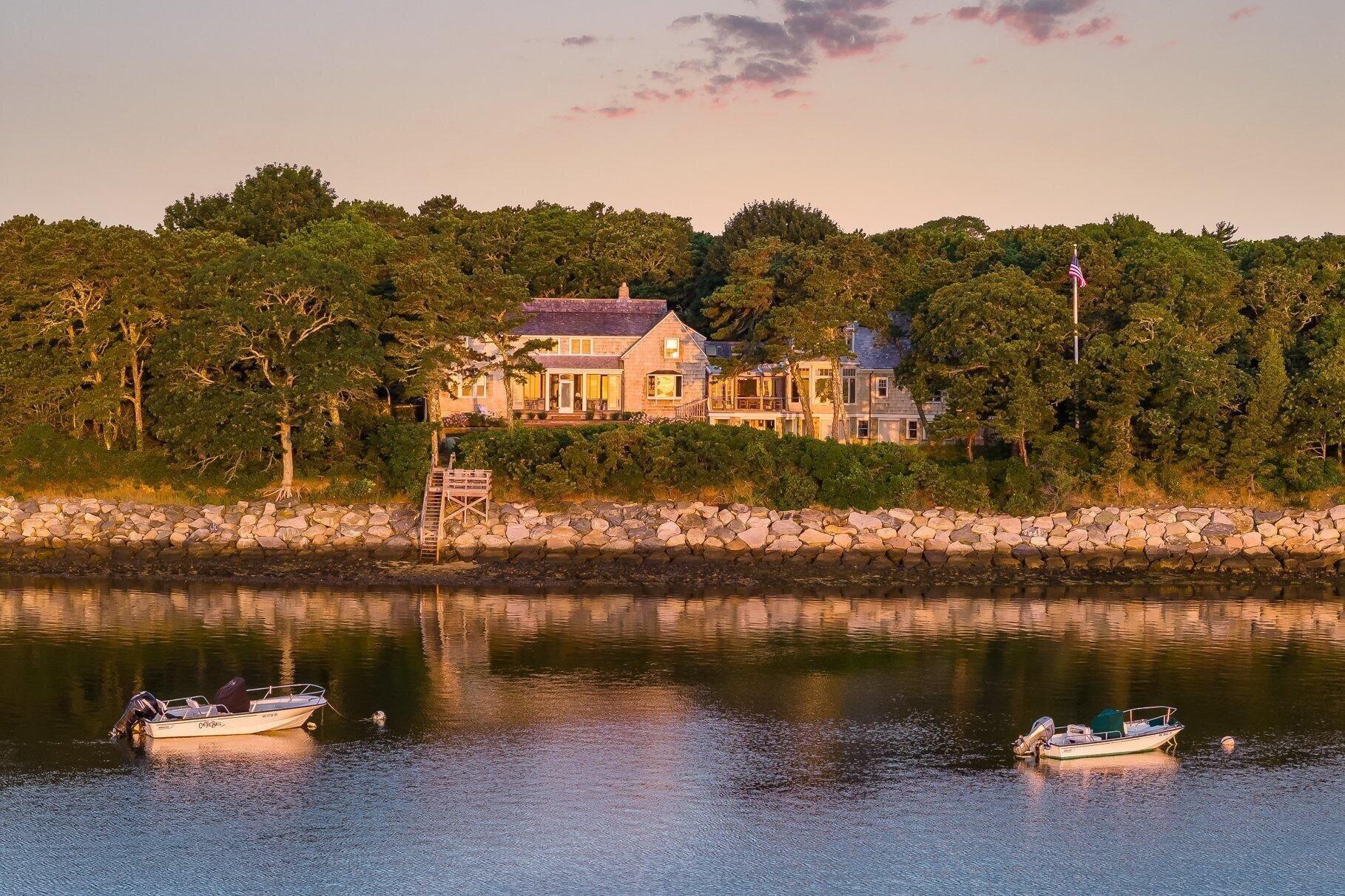 2079 Head Of The Bay Road Harwich, MA 02645 - Photo 34 of 43 a view of a lake with a mountain in the background