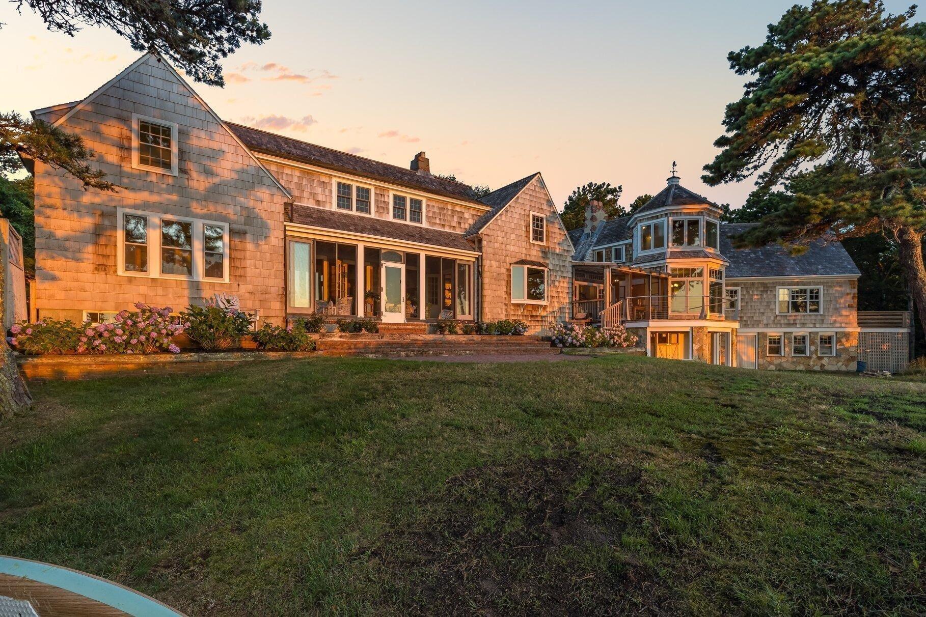 2079 Head Of The Bay Road Harwich, MA 02645 - Photo 35 of 43 a front view of a house with a garden