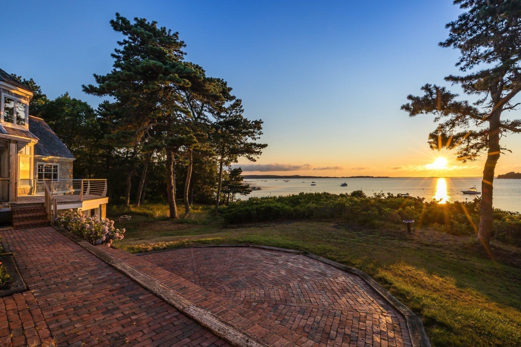 2079 Head Of The Bay Road Harwich, MA 02645 - Photo 37 of 43 a view of a backyard with plants and lake view