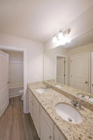 a view of a chairs and table in the patio