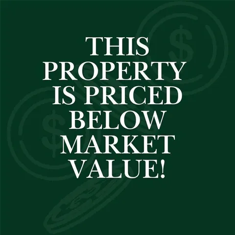 a kitchen with stainless steel appliances granite countertop a stove a sink a refrigerator and a microwave