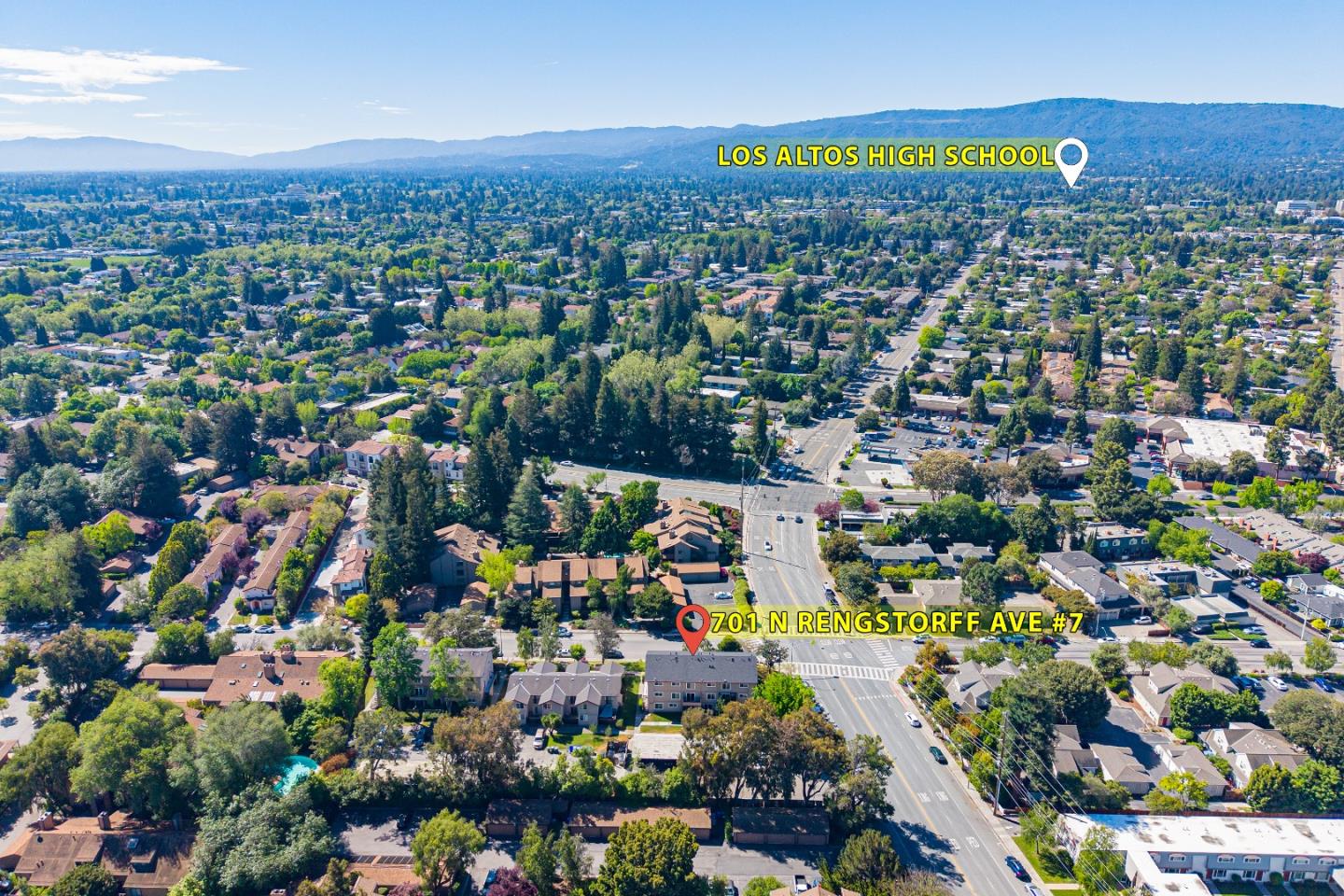 701 North Rengstorff Avenue, Unit 7 Mountain View, CA 94043 - Photo 30 of 32 an aerial view of residential houses with outdoor space and swimming pool