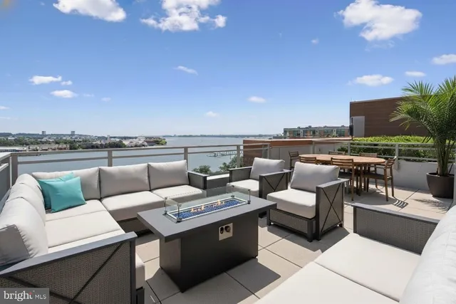 a kitchen with granite countertop a sink and cabinets