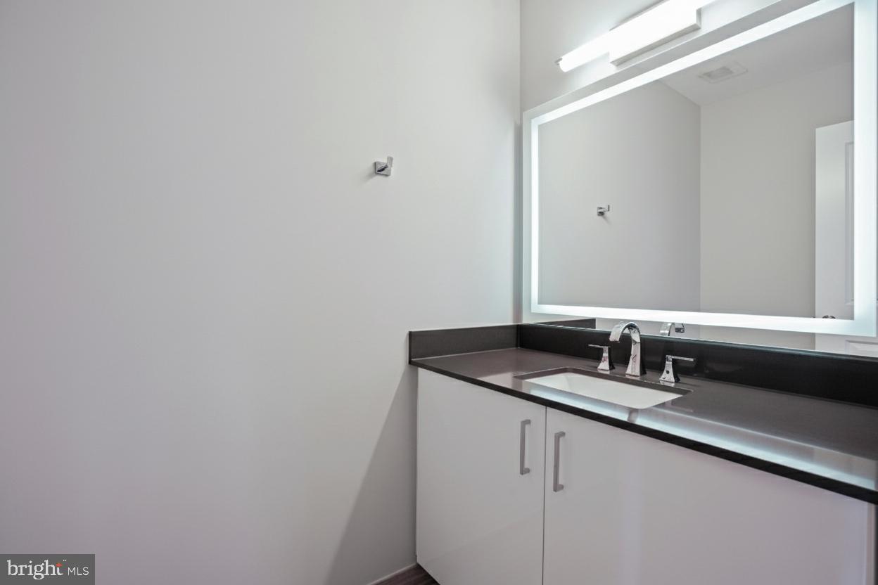 88 V Street Southwest, Unit PH1 Washington, DC 20024 - Photo 49 of 66 Entrance powder room - half bathroom