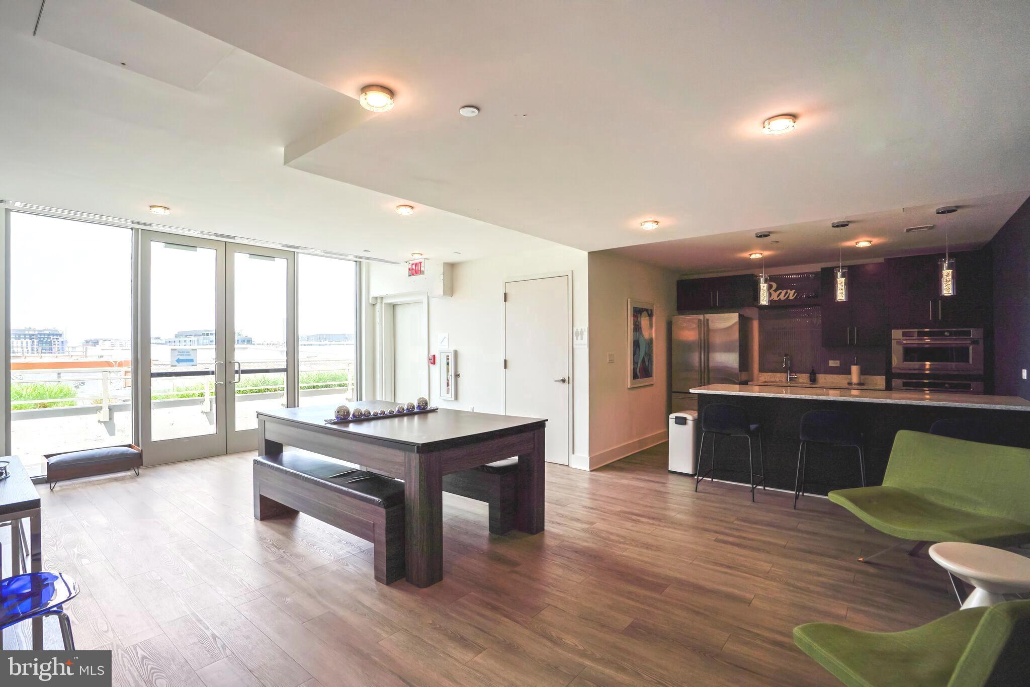 88 V Street Southwest, Unit PH1 Washington, DC 20024 - Photo 57 of 66 Rooftop area w pool table & equipped prep kitchen