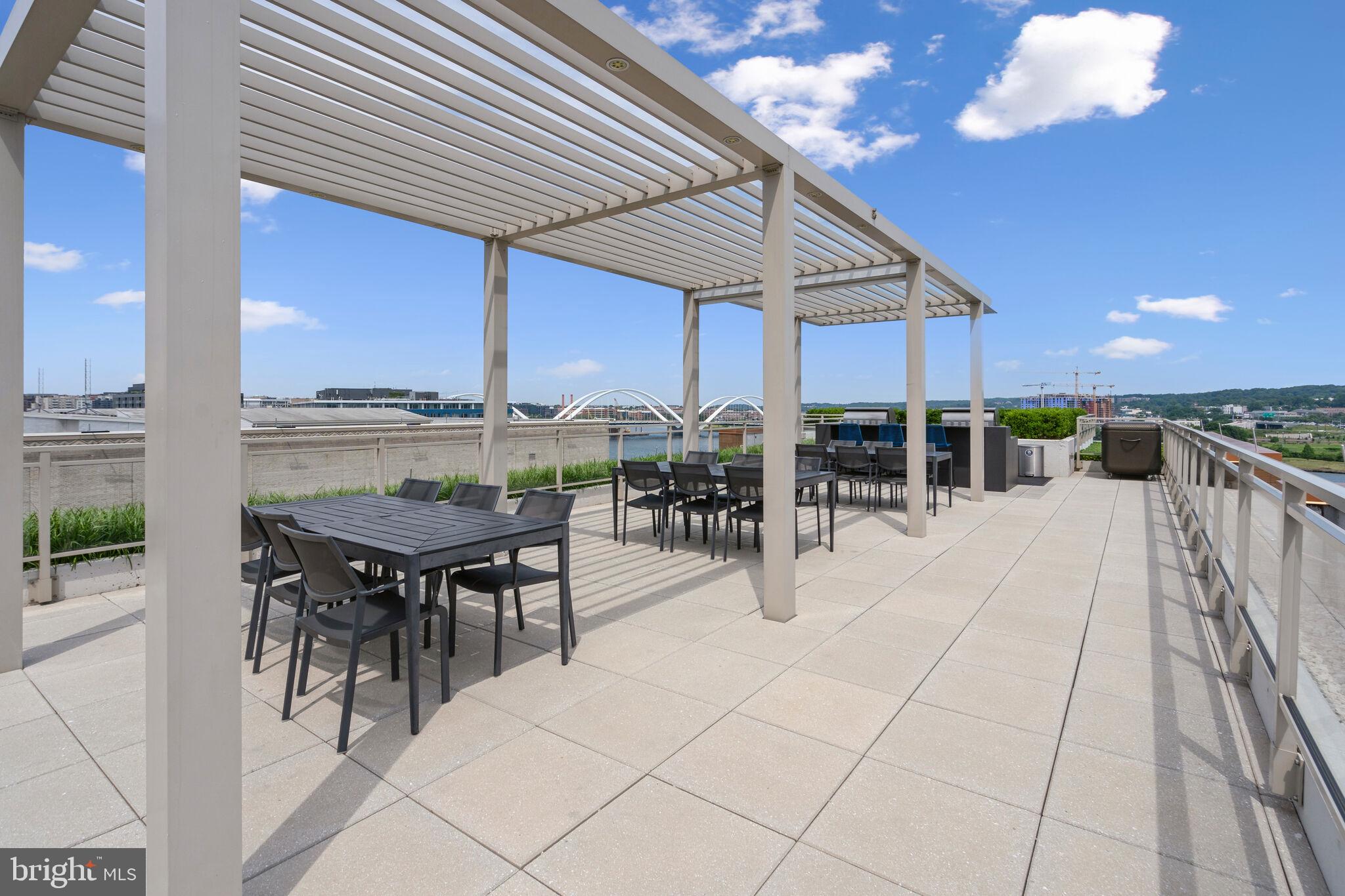 88 V Street Southwest, Unit PH1 Washington, DC 20024 - Photo 58 of 66 Pergola & dining area with spectacular views