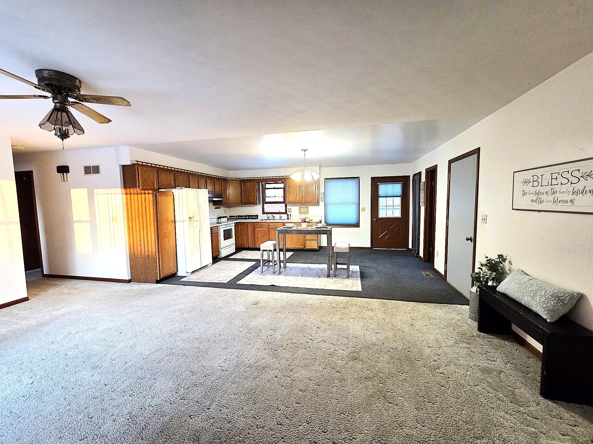 710 Madison Street Bellevue, MI 49021 - Photo 3 of 33 frontdoor view livingroomkitchen