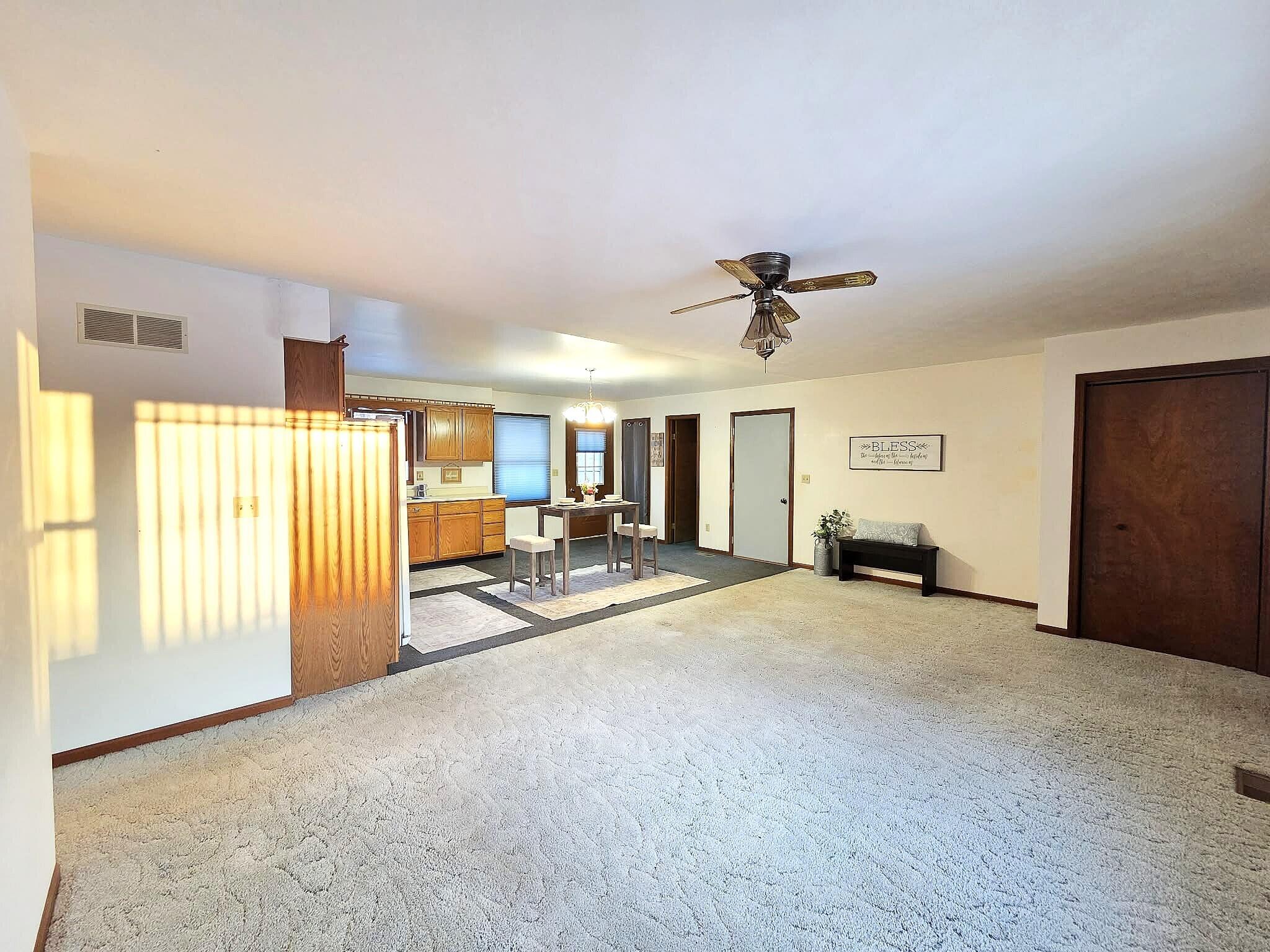 710 Madison Street Bellevue, MI 49021 - Photo 10 of 33 livingroomkitchen