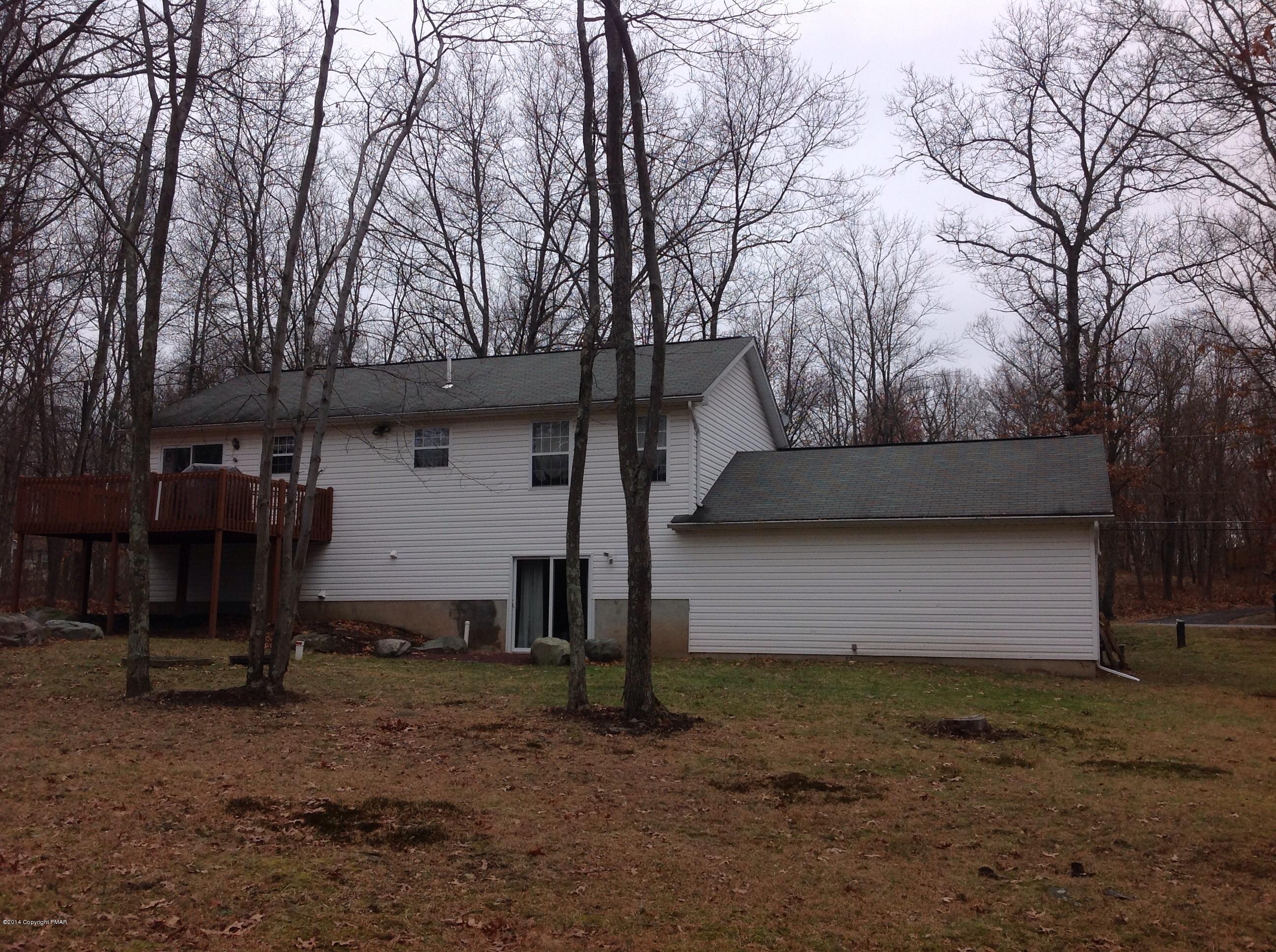 192 Timber Hill Road Henryville, PA 18332 - Photo 2 of 24 a front view of house with yard