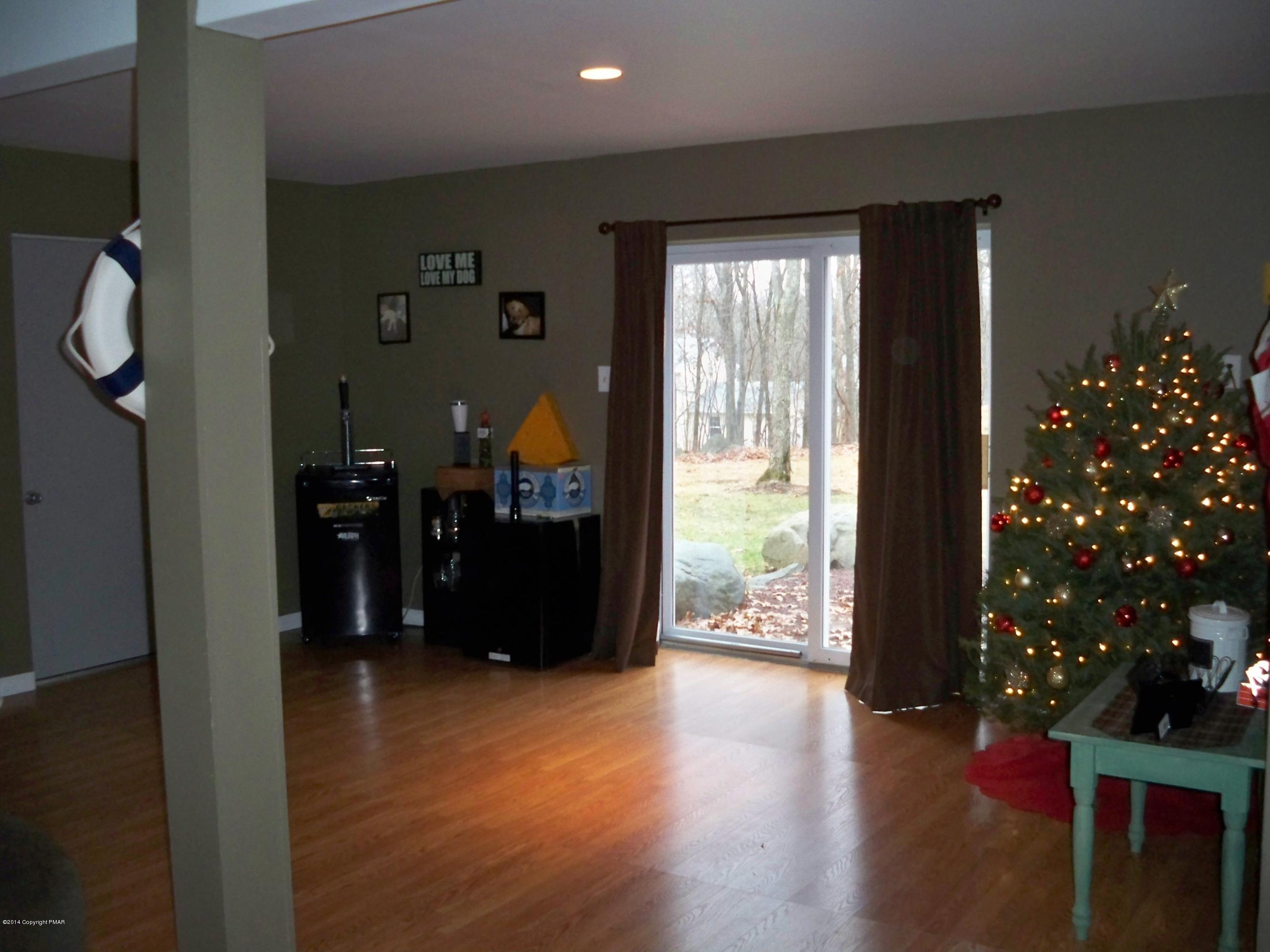 192 Timber Hill Road Henryville, PA 18332 - Photo 22 of 24 a view of a hallway with wooden floor and entryway