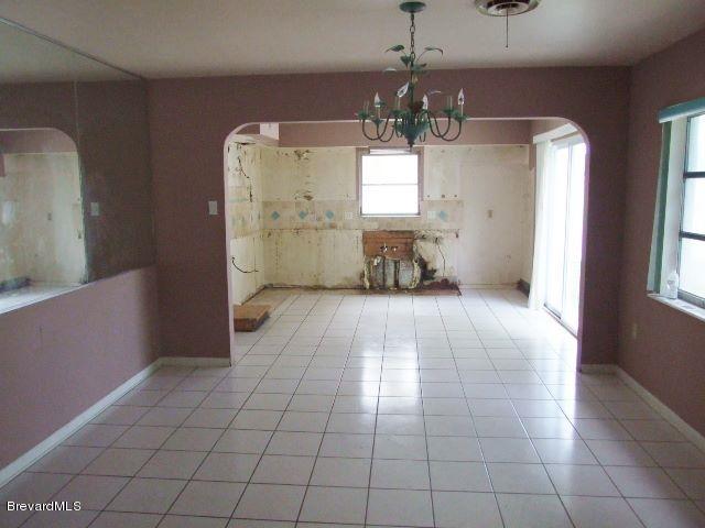 971 Bali Road Cocoa Beach, FL 32931 - Photo 4 of 8 dining to kitchen