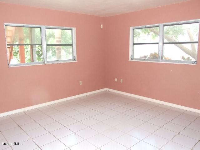 971 Bali Road Cocoa Beach, FL 32931 - Photo 7 of 8 master bedroom