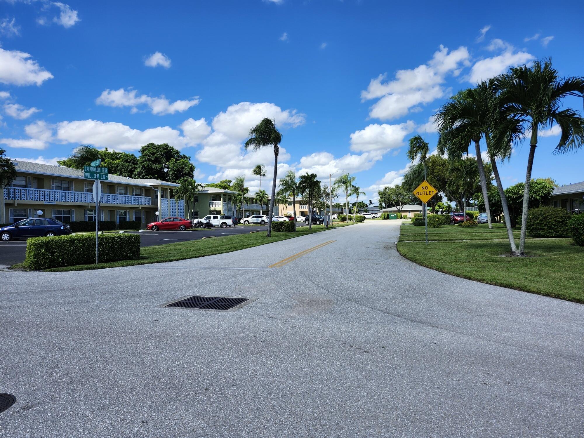 1141 Calamondin Terrace, Unit 101 Delray Beach, FL 33445 - Photo 18 of 21 a view of a street