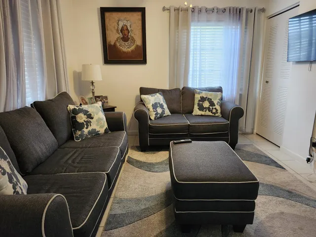 a living room with furniture and a couch