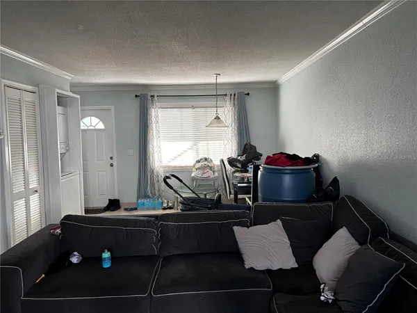 a room with furniture and window