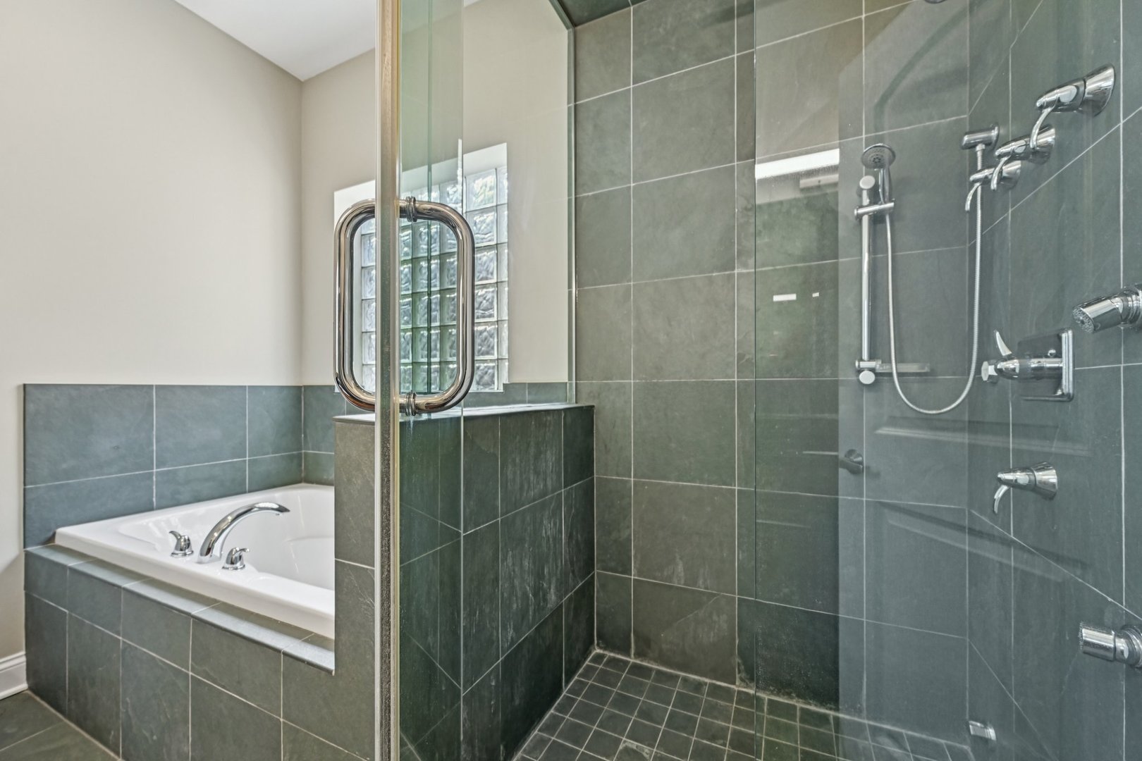 2248 North Racine Avenue, Unit 3 Chicago, IL 60614 - Photo 15 of 32 a bathroom with a bathtub and shower
