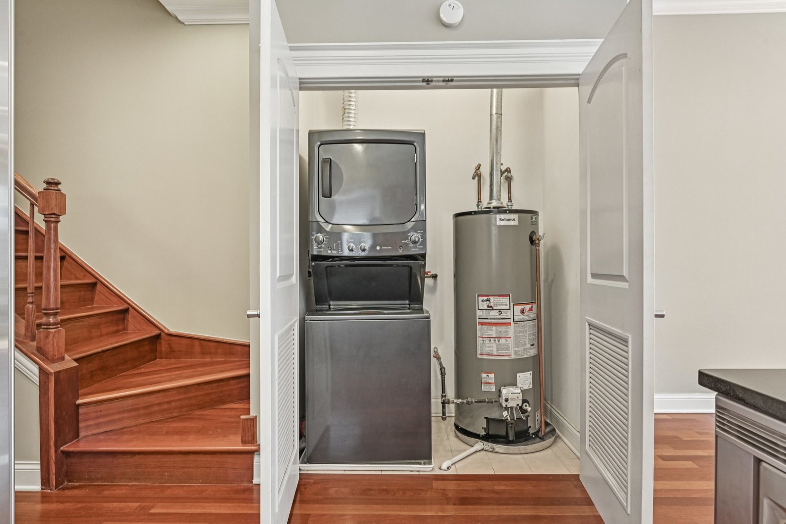 2248 North Racine Avenue, Unit 3 Chicago, IL 60614 - Photo 20 of 32 a view of a hallway with wooden floor and staircase