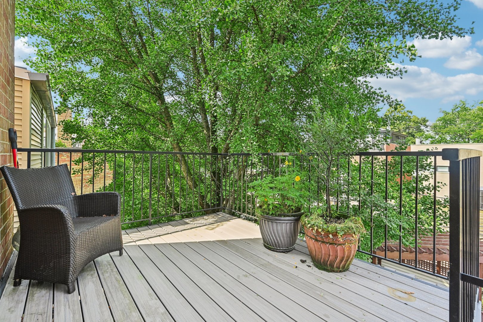 2248 North Racine Avenue, Unit 3 Chicago, IL 60614 - Photo 26 of 32 a view of balcony with two chairs and wooden floor