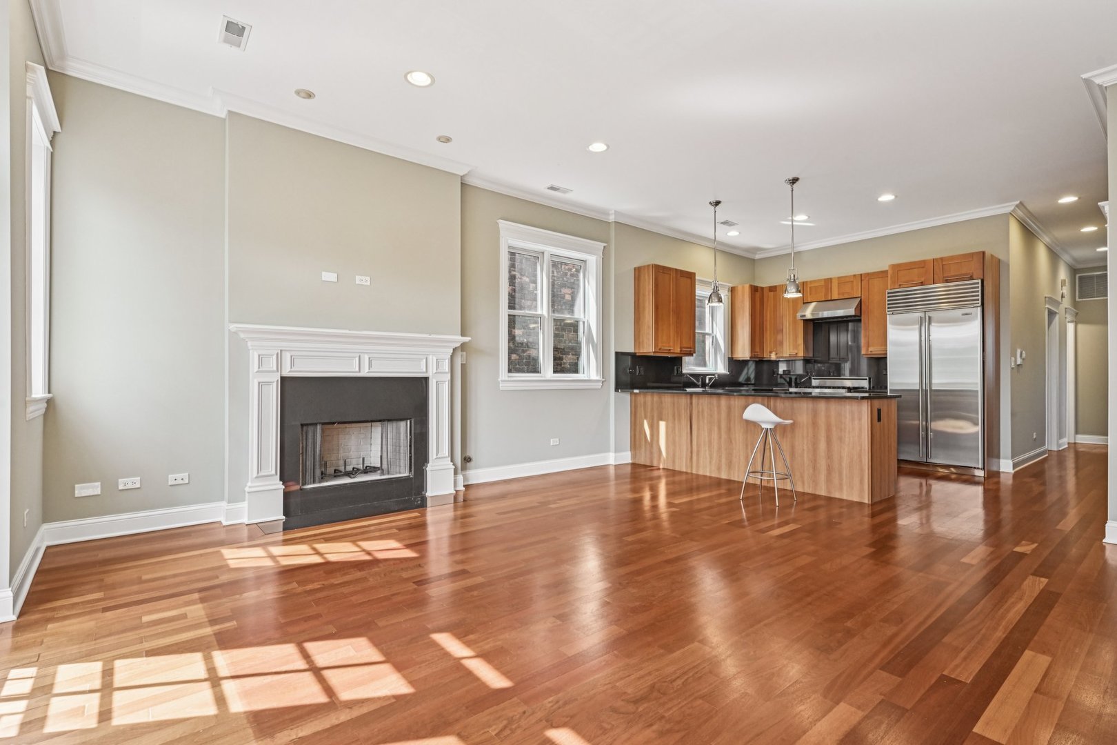 2248 North Racine Avenue, Unit 3 Chicago, IL 60614 - Photo 5 of 32 a view of a kitchen with furniture and wooden floor