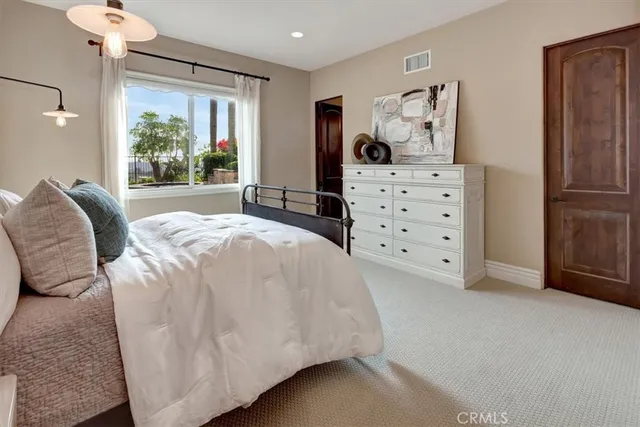 a kitchen with stainless steel appliances kitchen island granite countertop a sink and cabinets