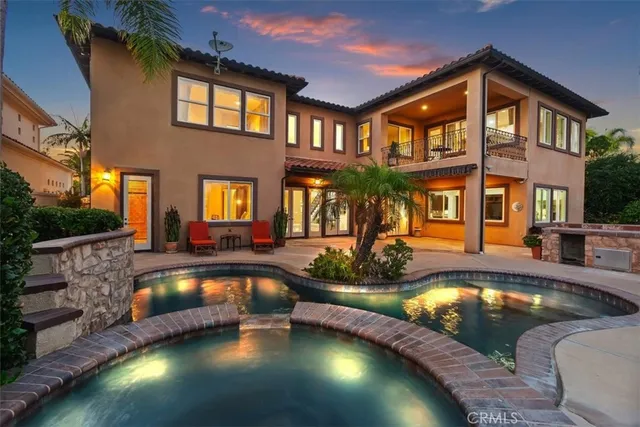 a view of a swimming pool with a lounge chair