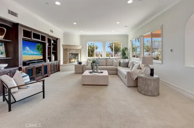 a spacious bedroom with a bed and a window