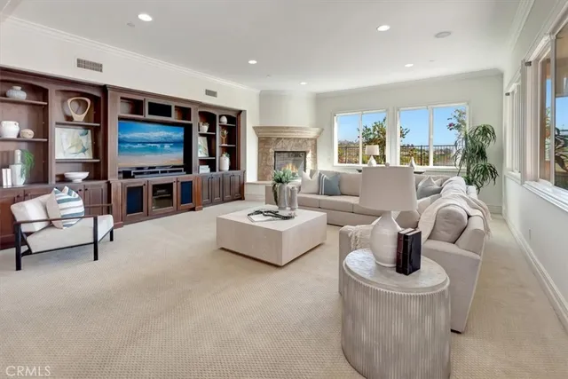 a view of a kitchen with a sink and a refrigerator