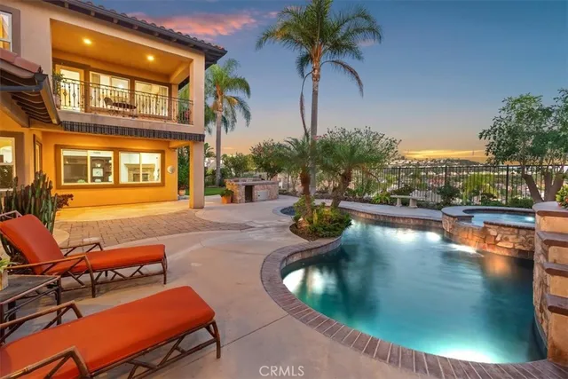 a view of hall way with furniture and floor to ceiling window