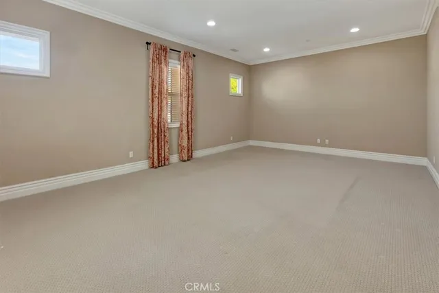 a view of a house with a yard and plants