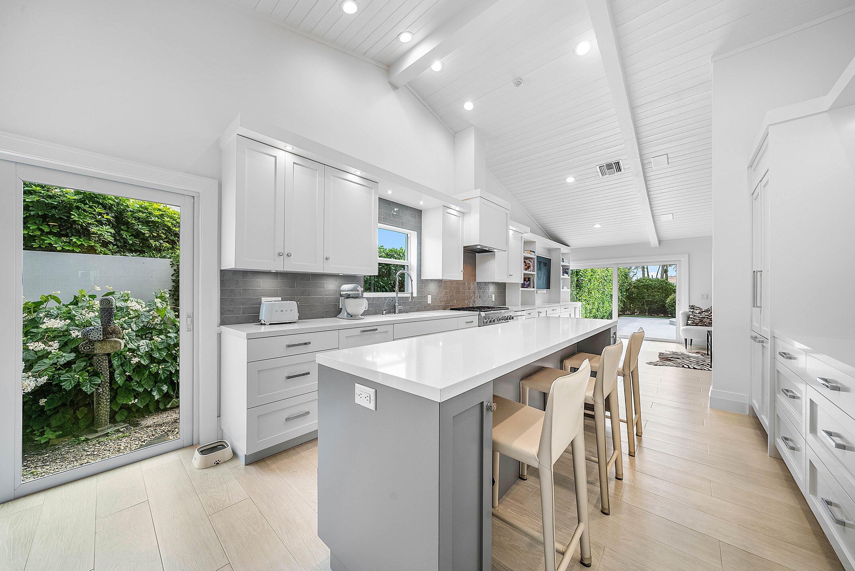 4199 Bocaire Boulevard Boca Raton, FL 33487 - Photo 13 of 82 Chef's kitchen with island