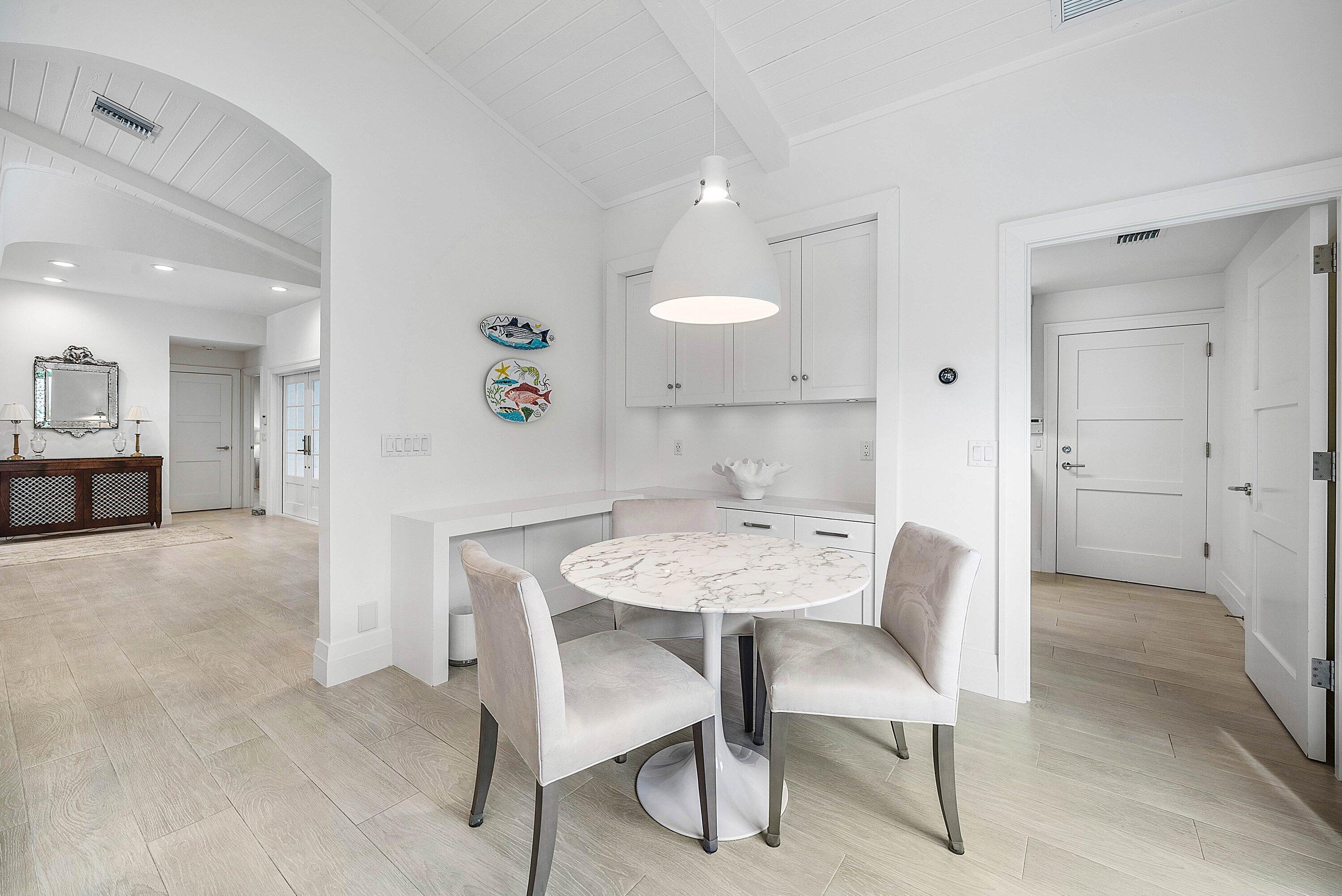 4199 Bocaire Boulevard Boca Raton, FL 33487 - Photo 15 of 82 a view of a dining room with furniture