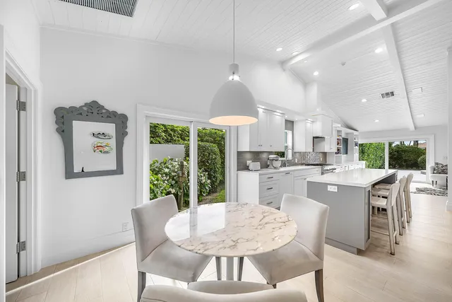 a spacious bedroom with a bed and a walk in closet