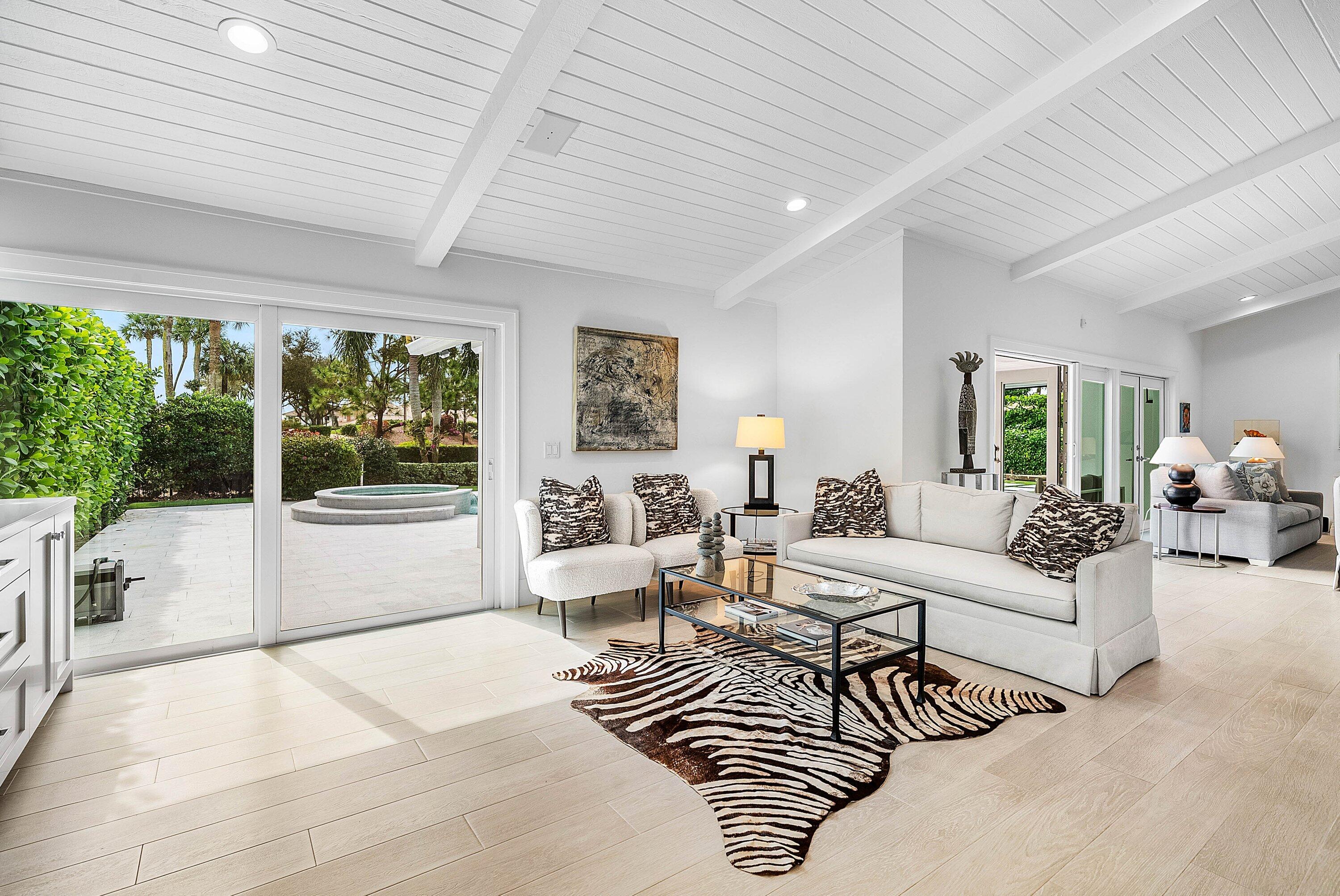 4199 Bocaire Boulevard Boca Raton, FL 33487 - Photo 20 of 82 a living room with furniture and a large window
