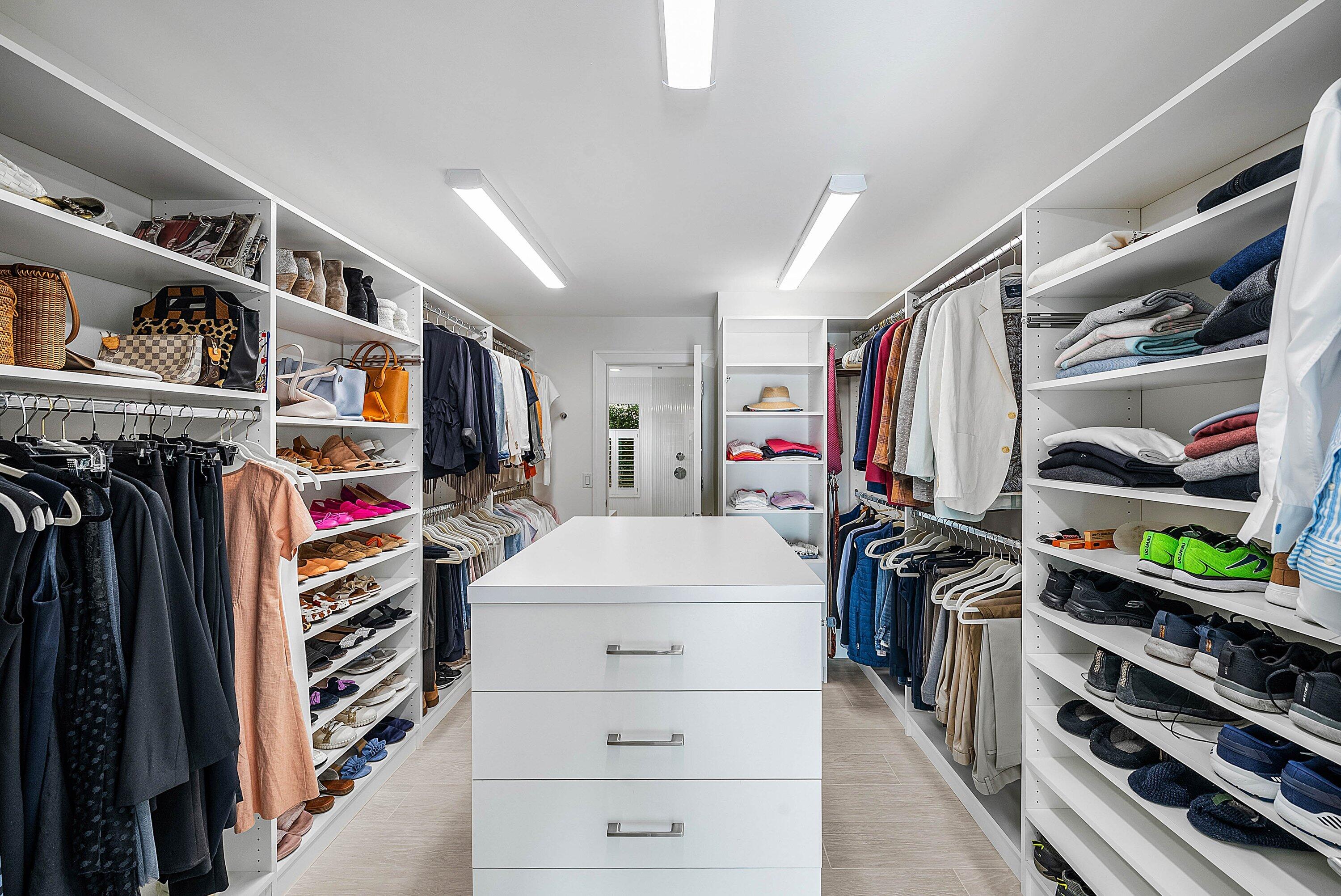 4199 Bocaire Boulevard Boca Raton, FL 33487 - Photo 30 of 82 a view of walk in closet with clothes and shoes