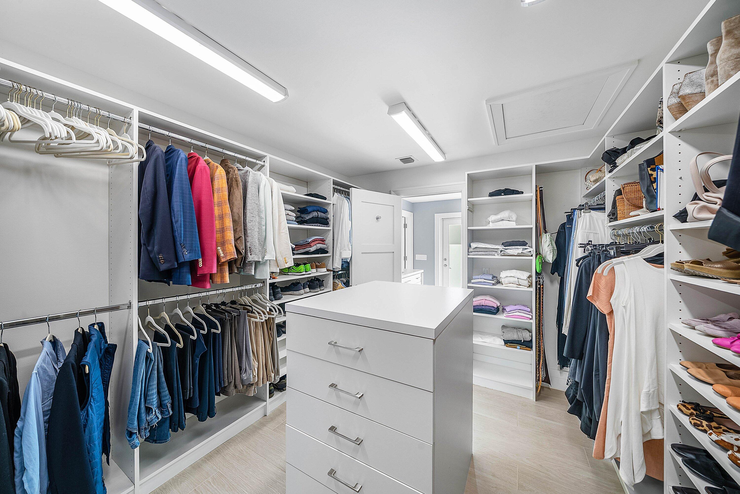 4199 Bocaire Boulevard Boca Raton, FL 33487 - Photo 31 of 82 a view of walk in closet with clothes and shoes