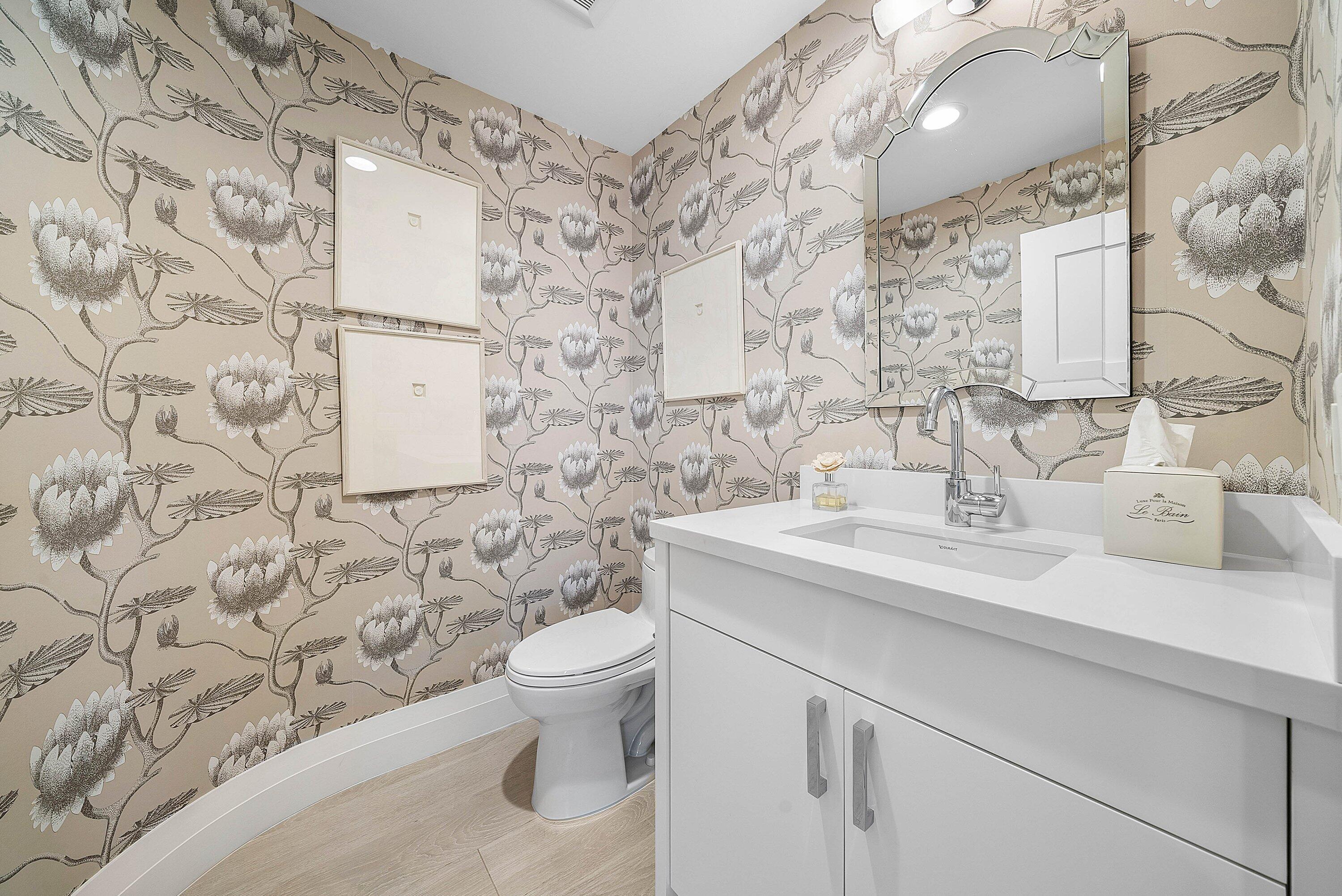 4199 Bocaire Boulevard Boca Raton, FL 33487 - Photo 40 of 82 a bathroom with a sink and a toilet