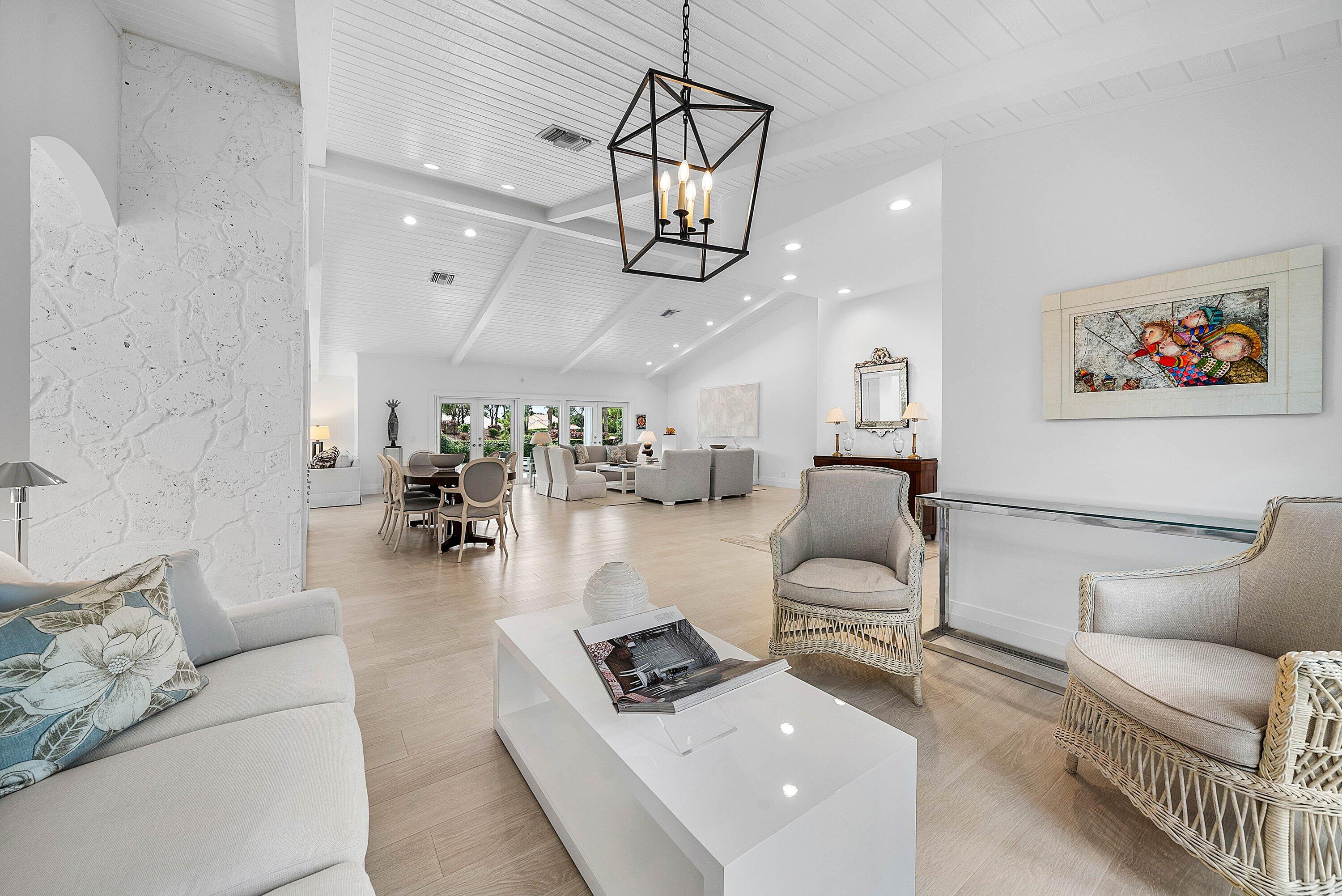 4199 Bocaire Boulevard Boca Raton, FL 33487 - Photo 5 of 82 a living room with furniture and wooden floor