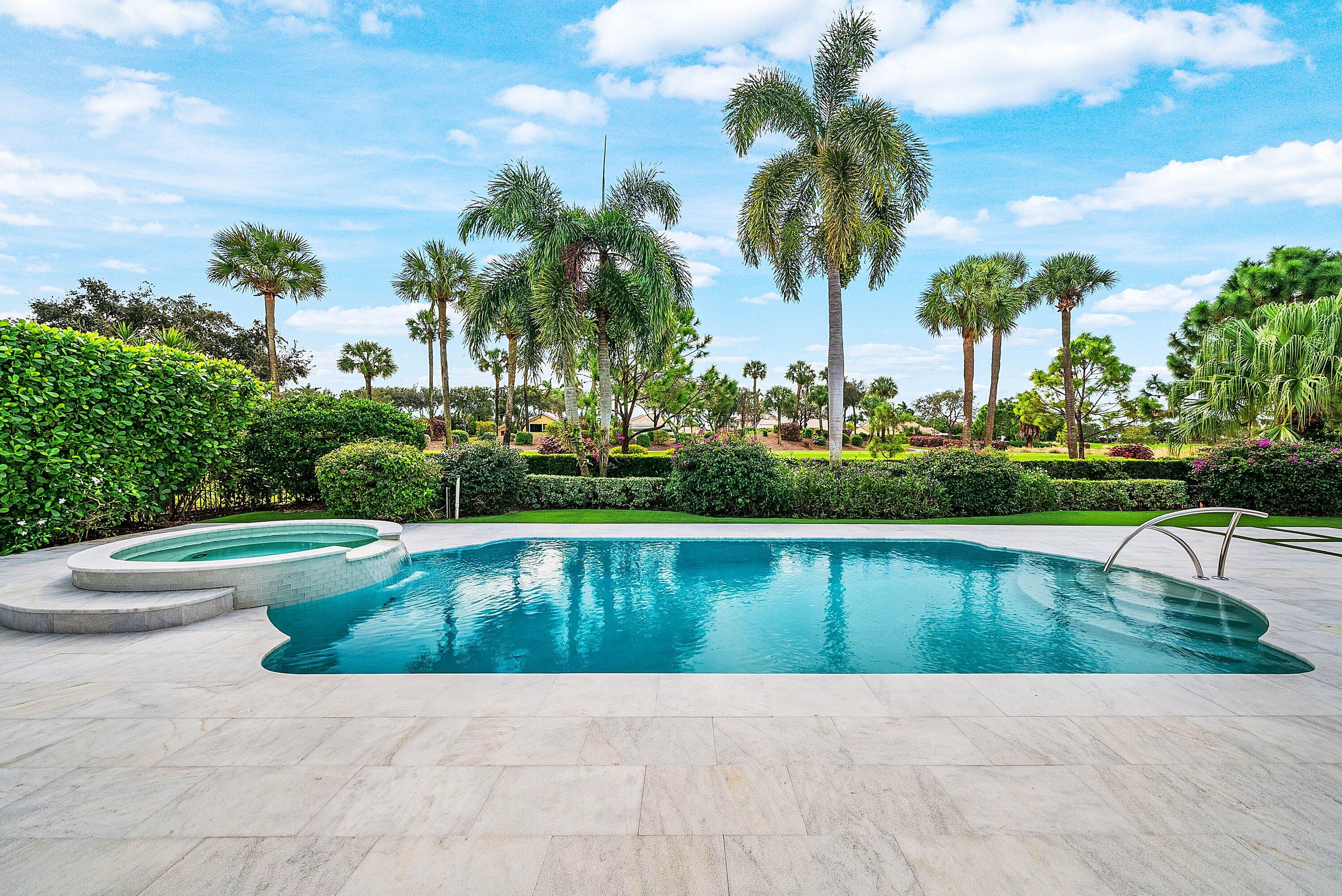 4199 Bocaire Boulevard Boca Raton, FL 33487 - Photo 55 of 82 a view of swimming pool with a garden and plants