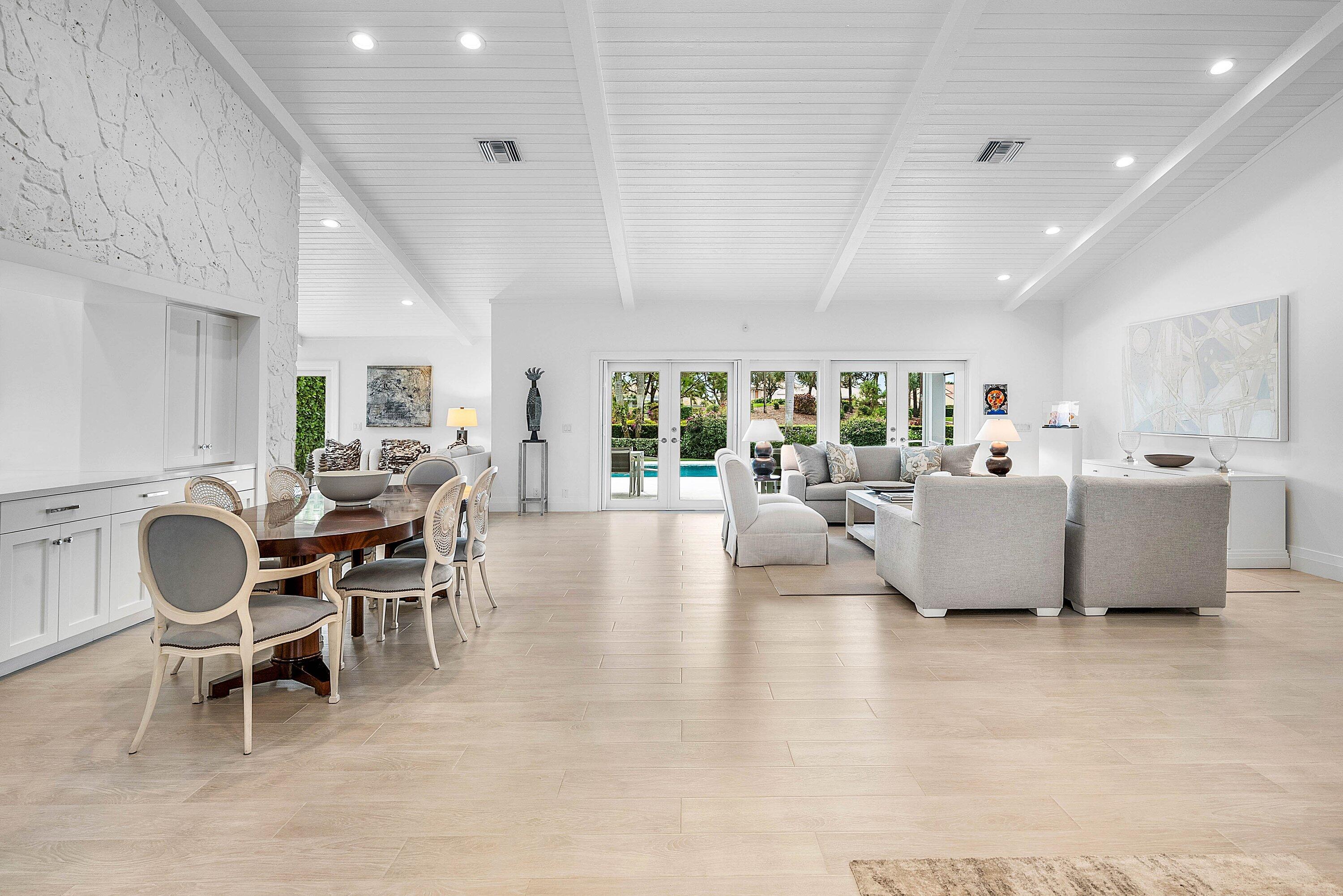 4199 Bocaire Boulevard Boca Raton, FL 33487 - Photo 6 of 82 a living room with furniture and a large window