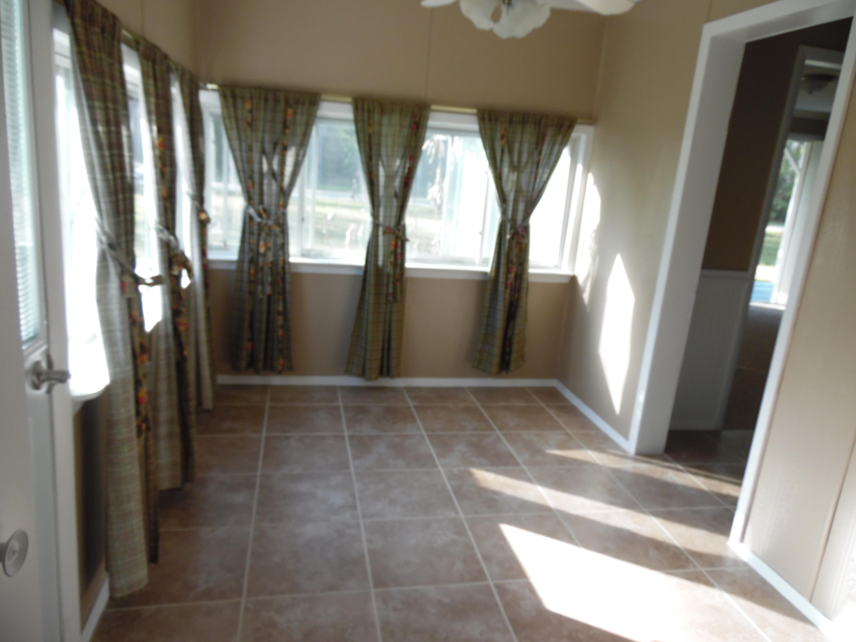 4005 King Lake Road DeFuniak Springs, FL 32433 - Photo 12 of 35 a view of entry way with wooden door